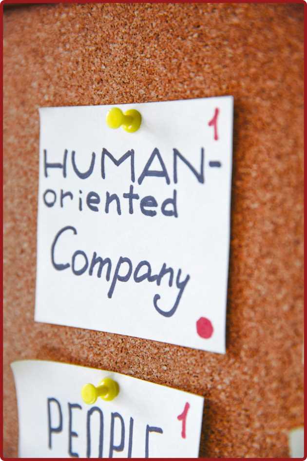 Human Oriented Company sign on blackboard